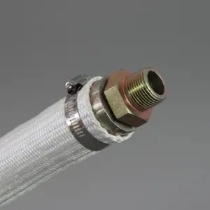White braided covering stopping near a metal hose fitting and retaining band